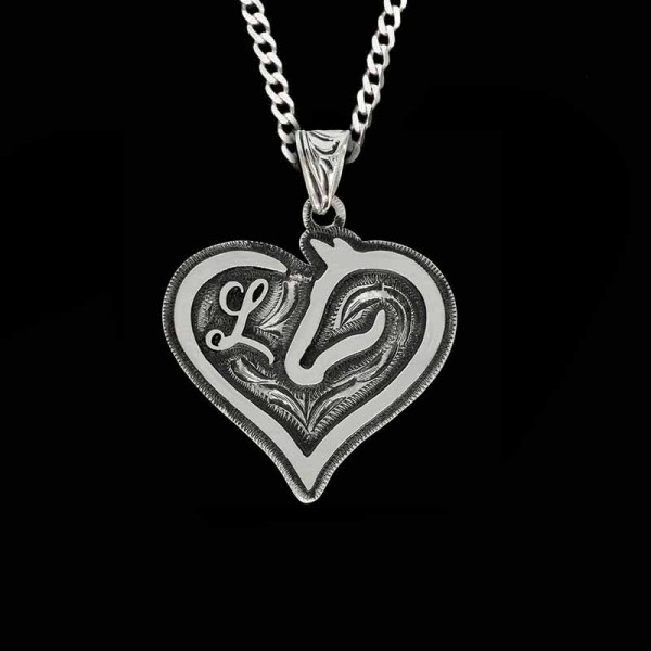 Our Horses, past and present are always kept close to our heart! Commemorate your trusty steed with the Equestrian Heart Custom Pendant. Customize it with his/her initial today!